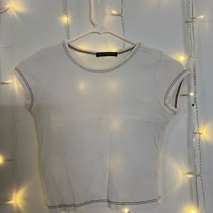 White Brandy Melville crop top with black outline